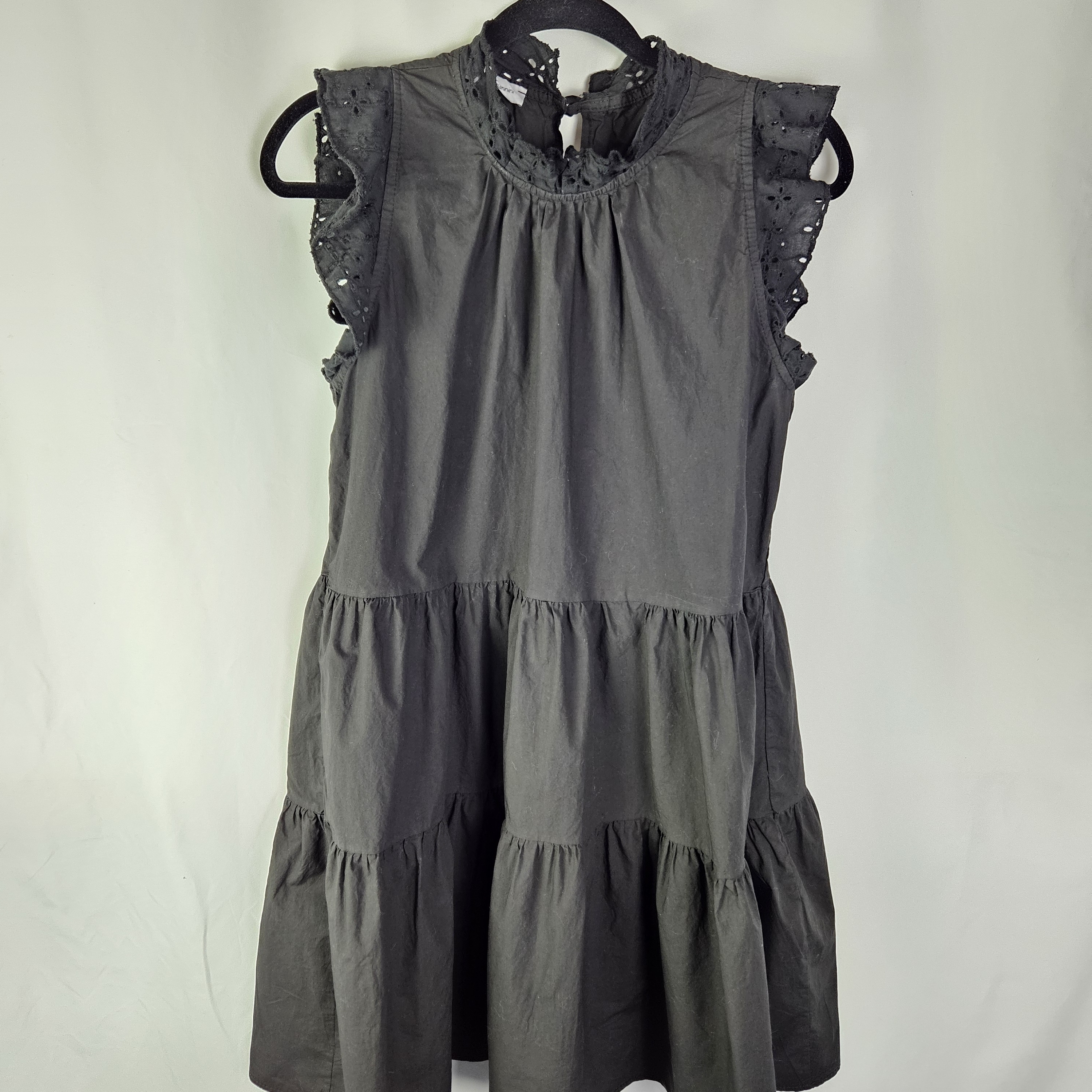 Ruffled Eyelet Tiered Mini Dress In Black